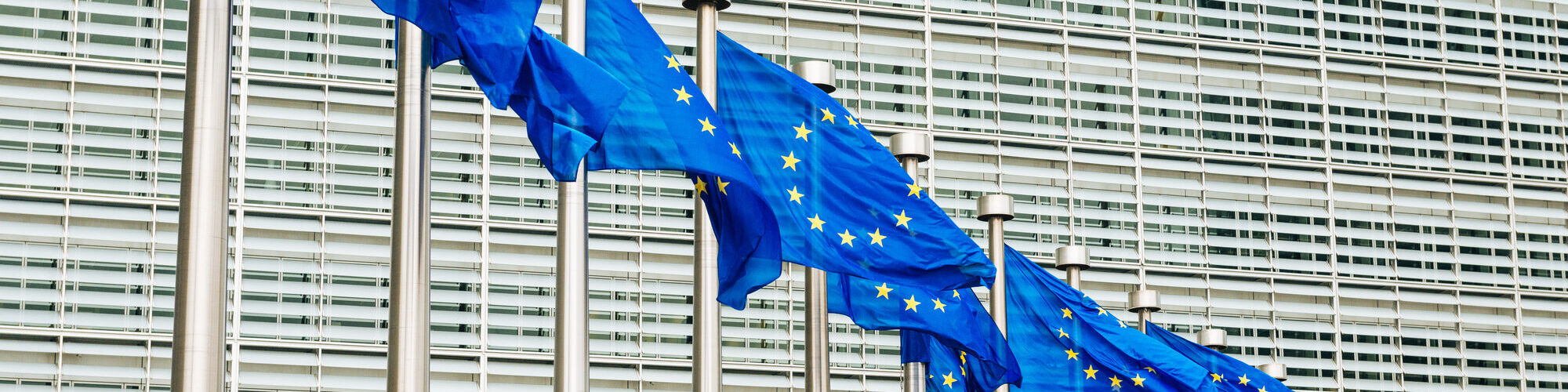 EU flags near EU headquarters Berlaymont European Commission bui